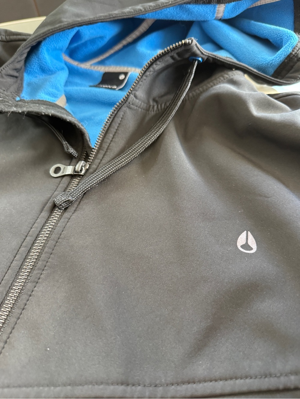Nixon Black Softshell Jacket with Bright Blue Fleece Lining - Picture 1 of 4